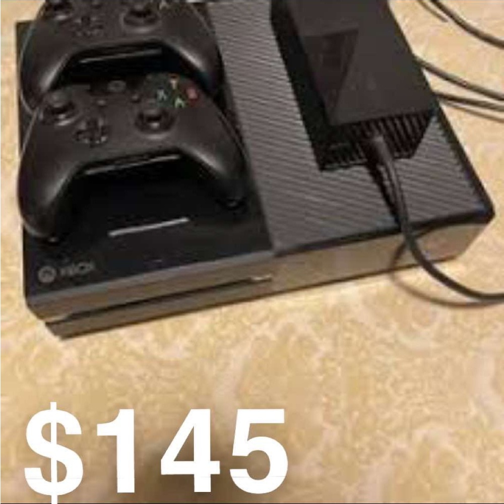 Used Xbox one with wires and controllers